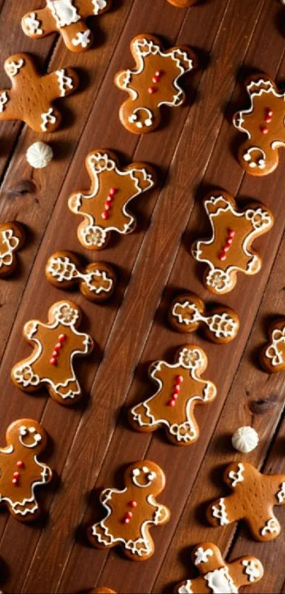 Festive gingerbread cookies on wooden background.