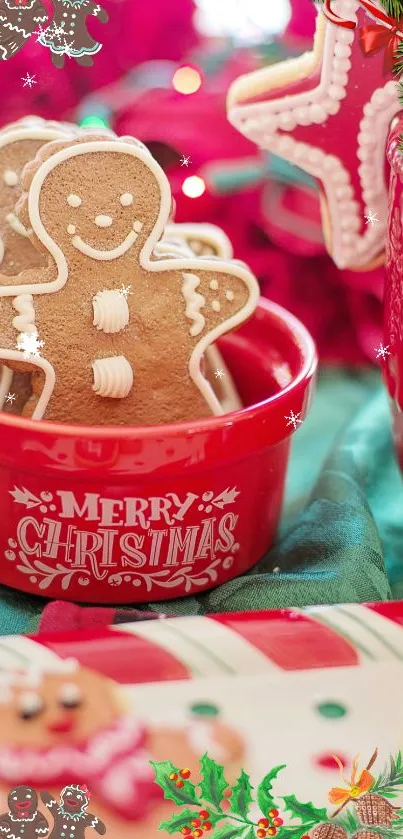 Gingerbread cookies in a red Christmas bowl with festive decor.