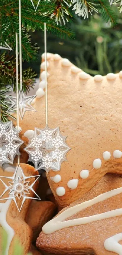 Star-shaped gingerbread cookies with icing and pine decorations for holiday wallpaper.