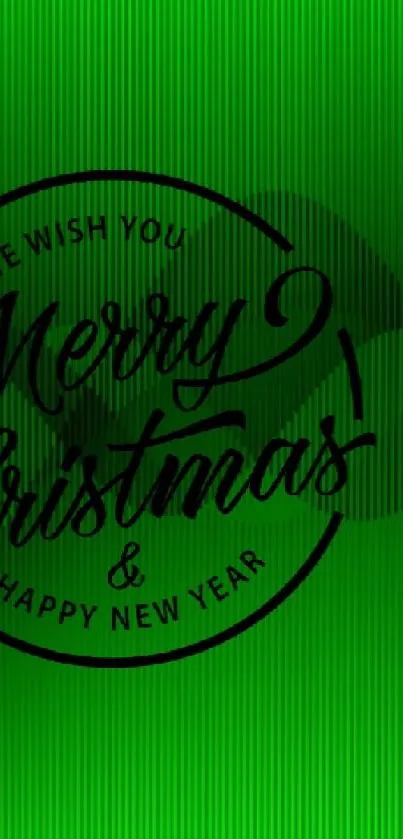 Green wallpaper with Merry Christmas greeting.