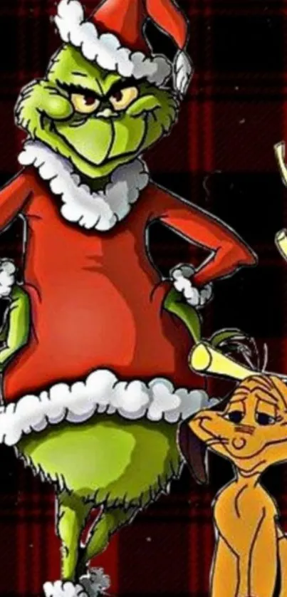 The Grinch in Santa suit with Max on plaid background.