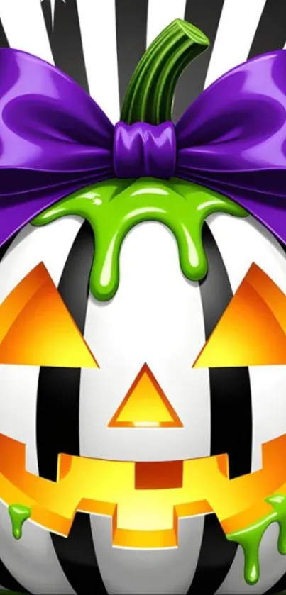 Colorful Halloween pumpkin with a purple bow on a striped background.