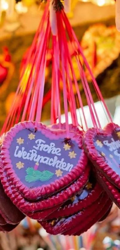 Colorful heart-shaped Christmas market decorations.