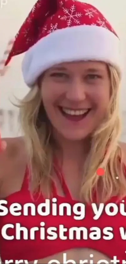 Woman in Santa hat enjoying beach holiday.