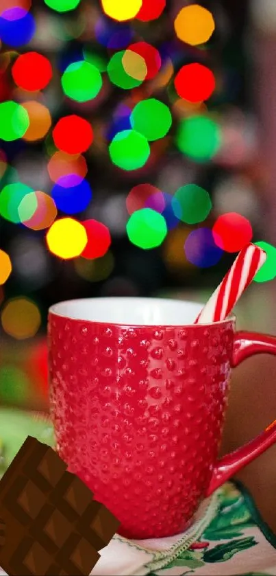 Festive mobile wallpaper with a red mug and Christmas lights bokeh.