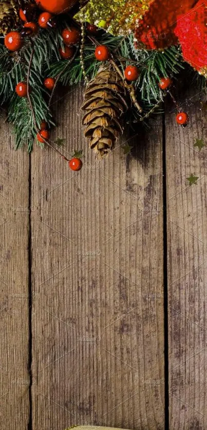 Festive holiday wallpaper with pine cones, red berries, and a golden ribbon.