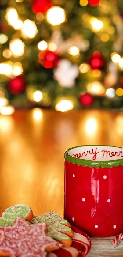 Red Christmas mug with cookies in festive setting.