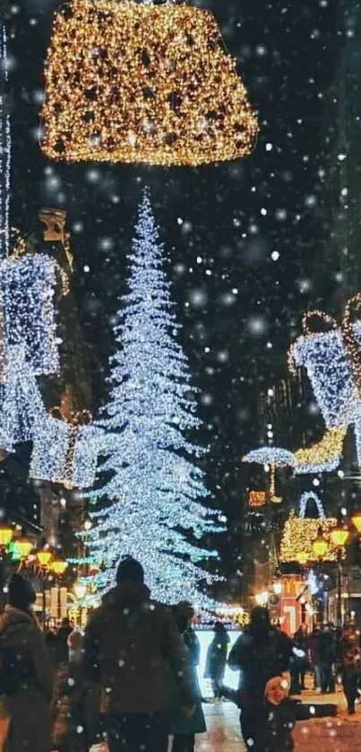 Festive city street with colorful holiday lights and a lit Christmas tree at night.