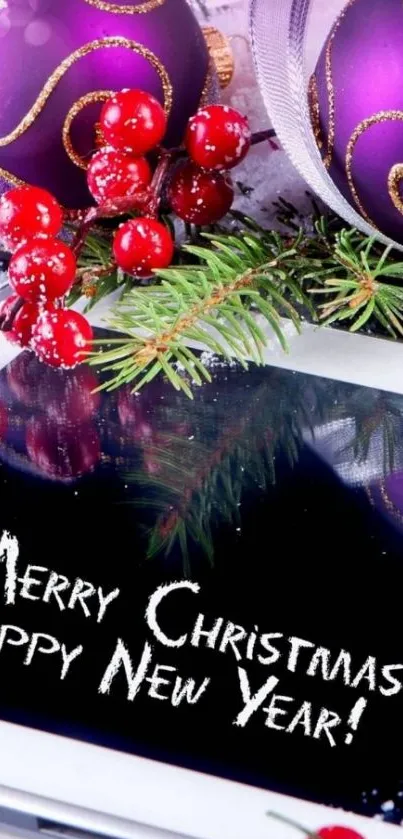 Festive purple Christmas ornaments with greenery and message on a tablet.