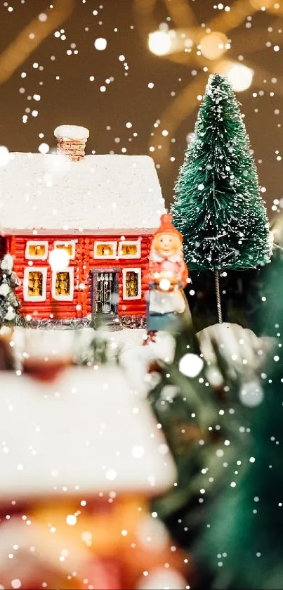 Christmas village with red house and snow.