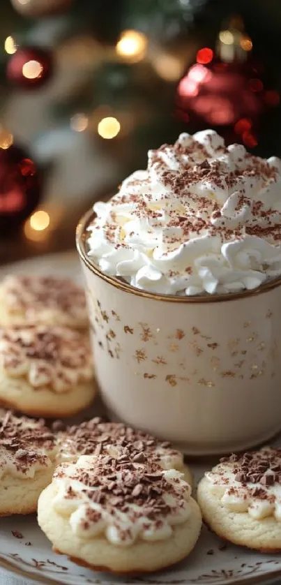 Decorated mug of cocoa with cookies on festive plate.