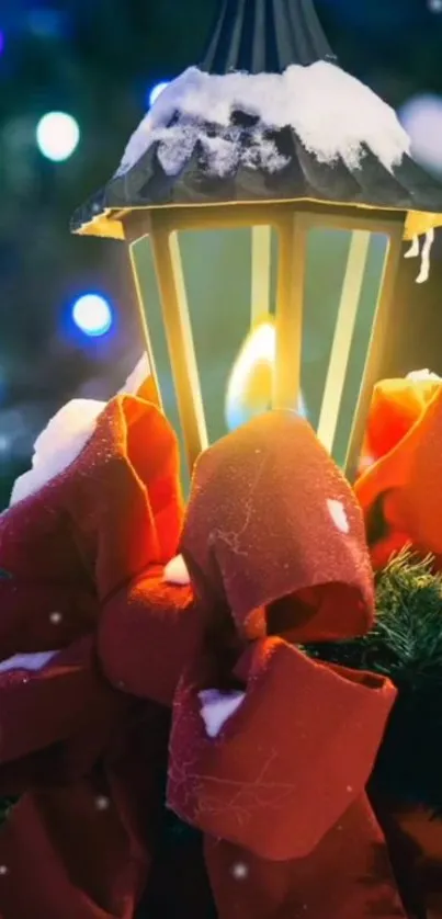 Festive lantern with red bows and snow accents for the holiday season.