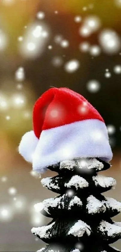 Miniature Christmas tree with Santa hat and snow.