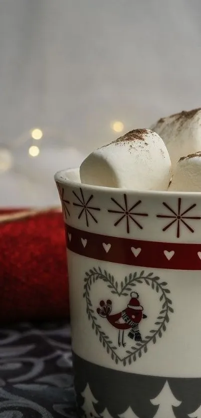 Festive mug with marshmallows and red holiday sweater background.