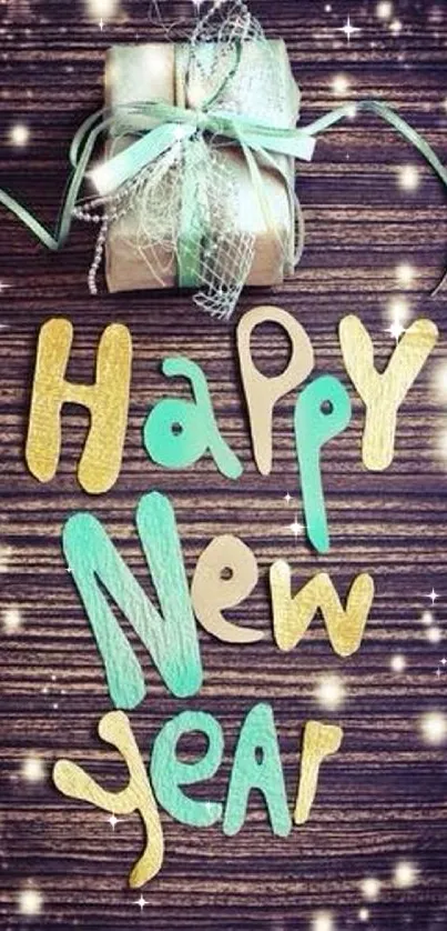 Happy New Year wallpaper with gift box and vibrant letters