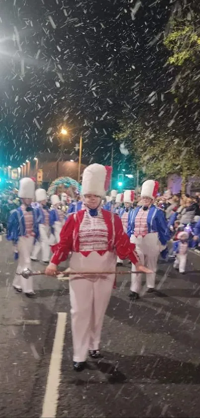 A vibrant night parade with marching bands under snowy skies.