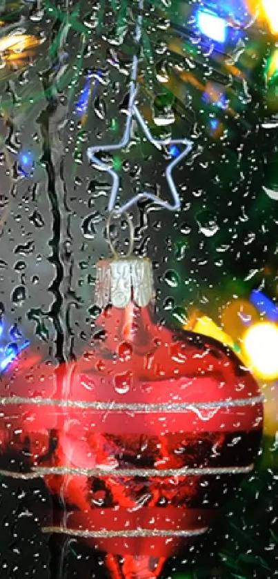 Red Christmas ornament with raindrops and lights.