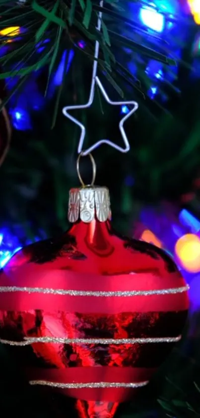 Red Christmas ornament with colorful lights.