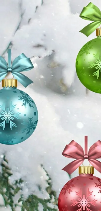 Festive Christmas ornaments with snow background for phone wallpaper.