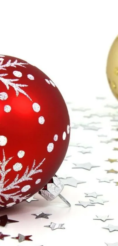 Red and gold ornaments with stars on white background.