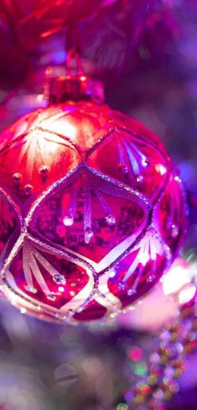 Colorful Christmas ornament with red and purple hues enhances festive holiday spirit.