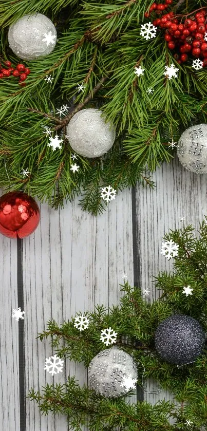 Festive wallpaper with pine branches, berries, and baubles on wood.