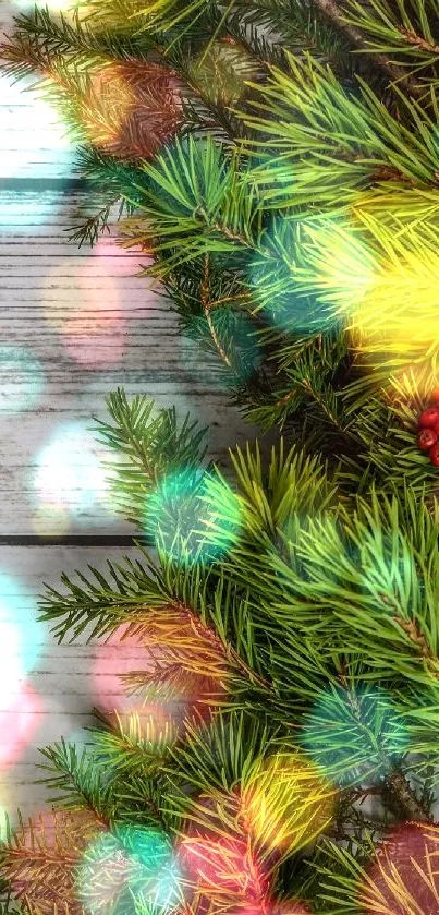 Festive pine garland with colorful bokeh lights and red berries.