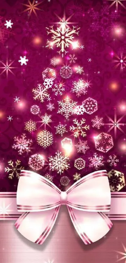 Festive pink Christmas tree wallpaper with snowflakes and ribbon bow.