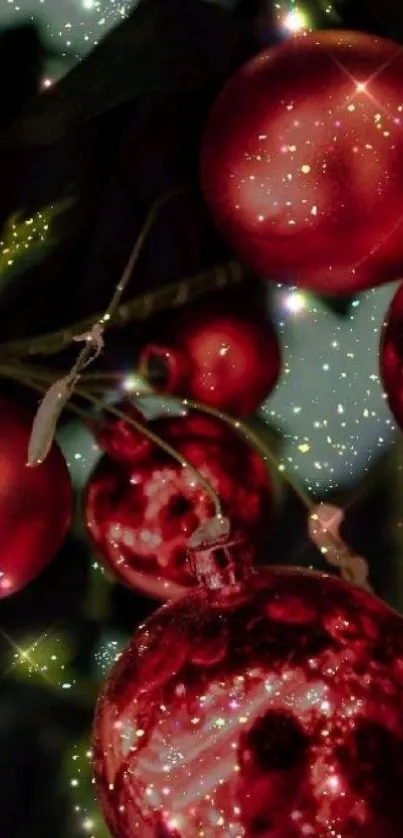 A festive wallpaper with red Christmas baubles and sparkling glitter.