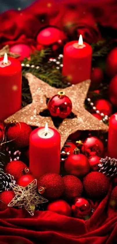 Festive arrangement with red candles and golden star on a mobile wallpaper.