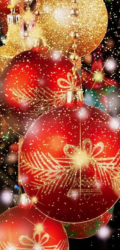 Red and gold Christmas ornaments with festive glow.