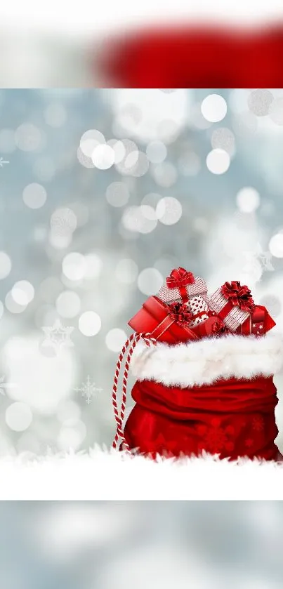 Festive red gift bag with snow and bokeh lights on a mobile wallpaper.