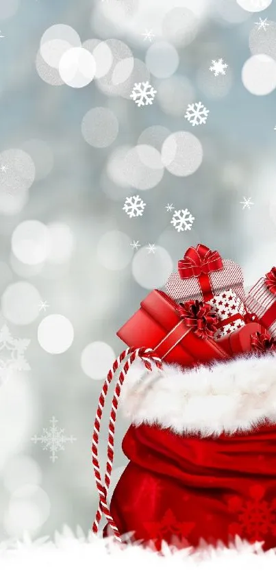 Festive red bag with gifts on snowy background.