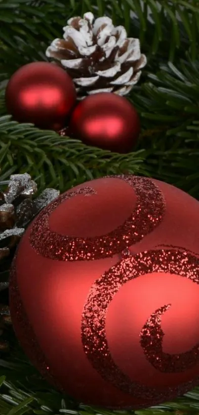 Red ornament with pine cones and branches for a festive look.