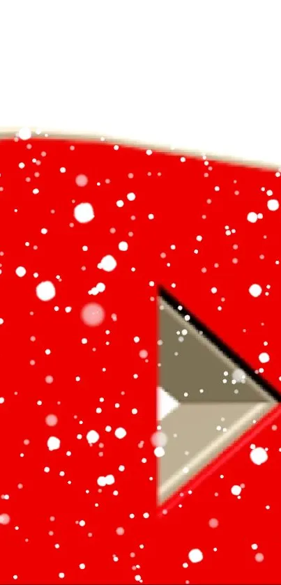 Red play button with snowy effect, festive theme.