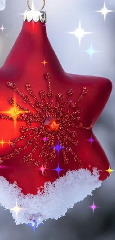 Red star ornament decorated with snow and ice, perfect for holiday theme wallpaper.
