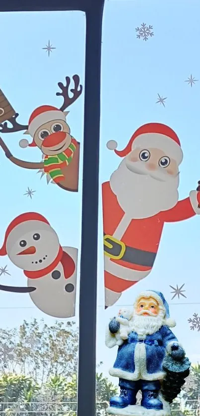 Festive window scene with Santa, Rudolph, and snowman, perfect for Christmas spirit.