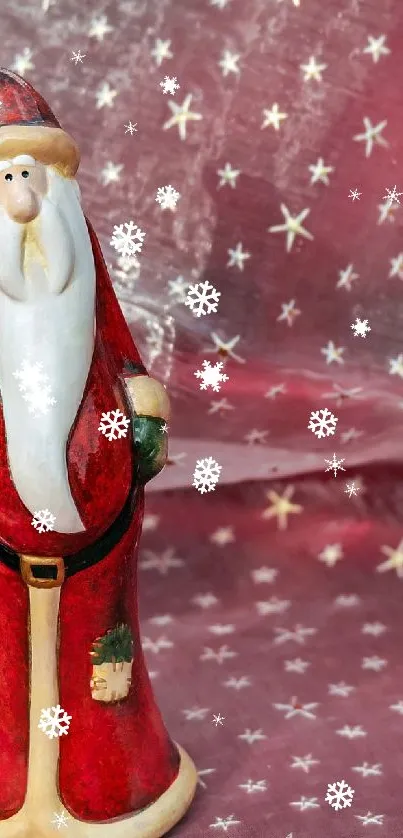 Festive Santa Claus figurines on a red starry background.