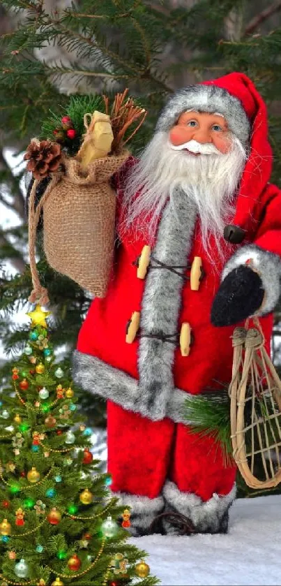 Santa Claus in red suit stands beside a Christmas tree in a snowy forest setting.