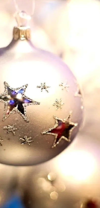 Silver Christmas ornaments with bokeh background.