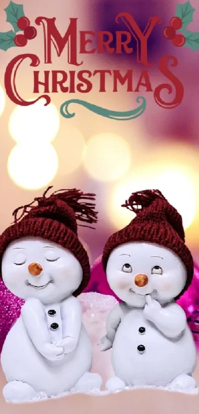 Cute snowmen with Merry Christmas and bokeh lights in the background.