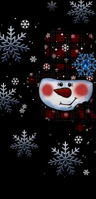 Snowman with plaid hat and snowflakes on a black background.
