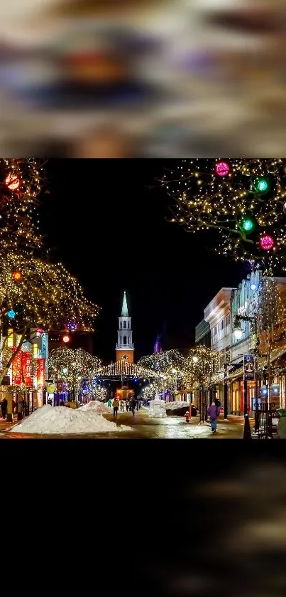 Festive street illuminated with lights at night.