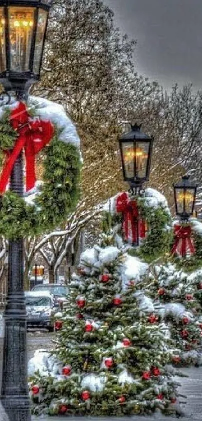 Snowy street lamps with Christmas wreaths and decorations.