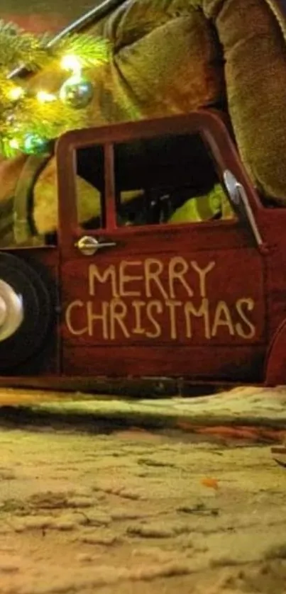 Vintage truck with 'Merry Christmas' under a decorated tree.