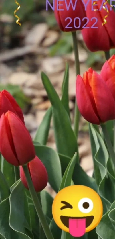 Red tulips with emoji for New Year 2022 celebration.