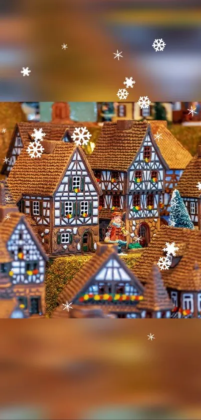 Festive village wallpaper with snowflakes and colorful houses.