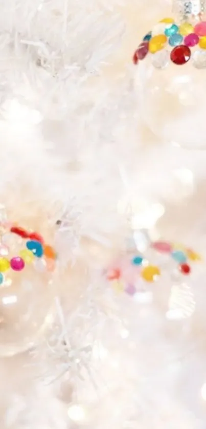 White Christmas ornaments with colorful decorations for a festive look.