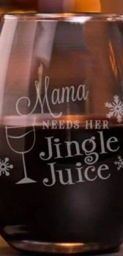 Wine glass with 'Mama Needs Her Jingle Juice' inscription.