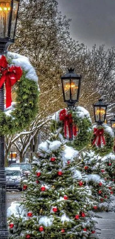 Snowy street with Christmas decorations and lanterns.